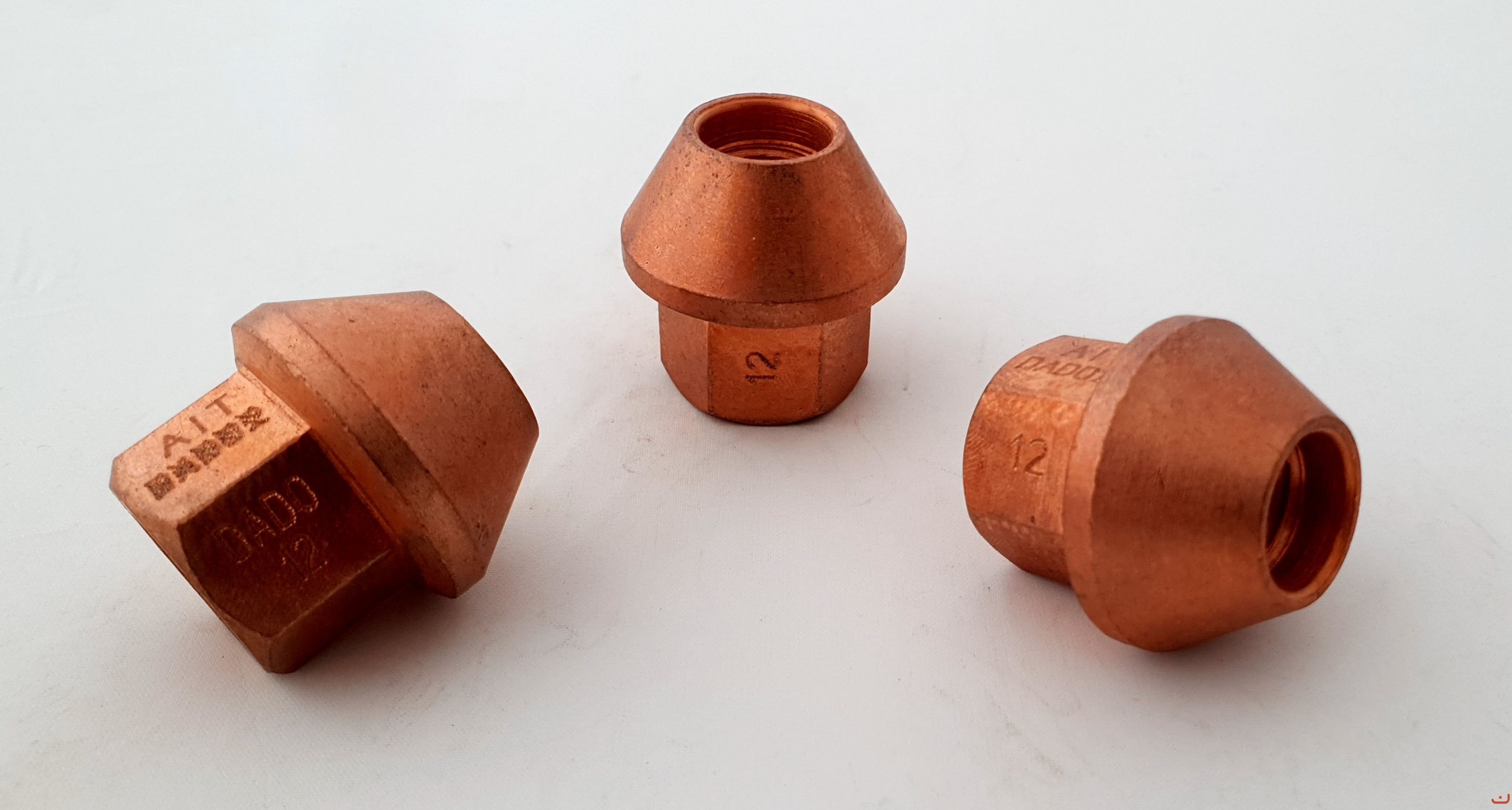 A.I.TECH AIT-DADO-12 Steel coppered nut 12x1,25, ex 19mm, o.d. 28mm, conical SEAT, total lenght 28,5mm Photo-0