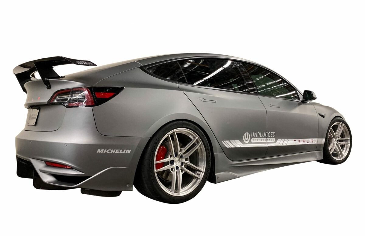 UNPLUGGED PERFORMANCE UP-M3-304-4.1 Ascension Rear Bumper - Optional Ascension-R Rear Diffuser Fins, Dry Carbon Gloss Clear for TESLA Model 3 Photo-1
