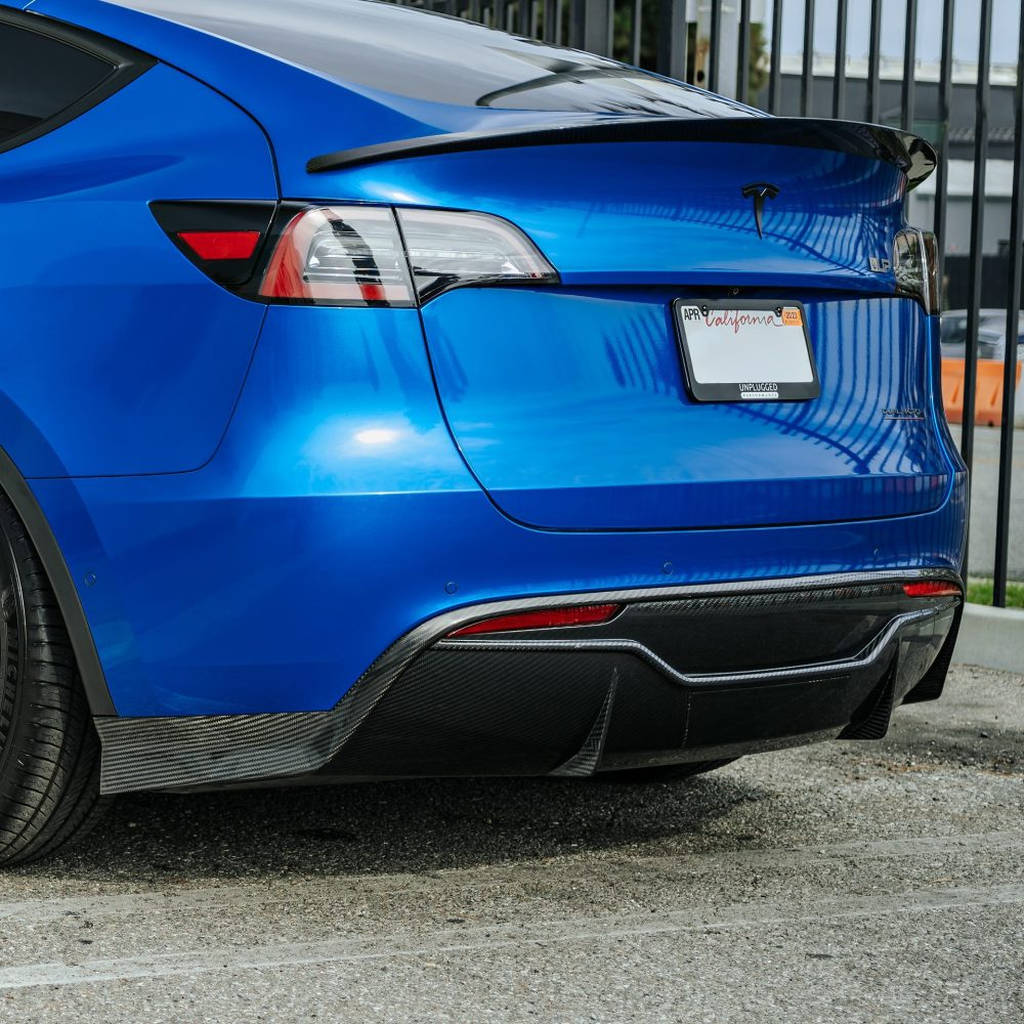 UNPLUGGED PERFORMANCE UP-MY-369-1.1 Ascension Rear Diffuser with Hitch Cover & Tow Hook Cover, Autoclaved Dry Carbon Fiber, Gloss for TESLA Model Y Photo-0