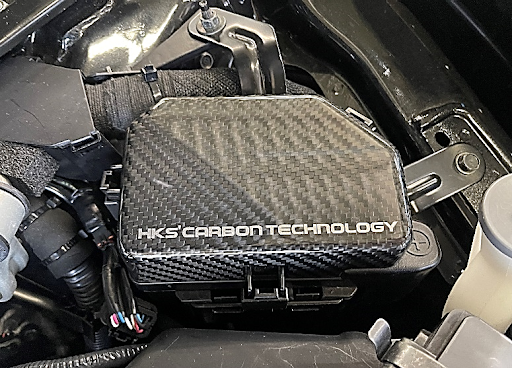 HKS 70026-AN002 Fuse Box Cover (carbon) for NISSAN 400Z (RZ34) 2023+ Photo-0