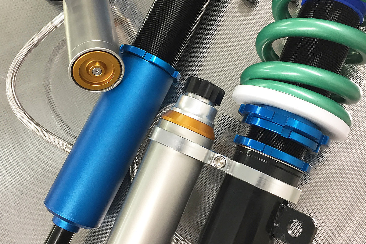 UNPLUGGED PERFORMANCE UP-M3-311-6.1 Coilover Set Pro Race Coilover Set, 2 Way, External Reservoir Custom (valving and spring) for TESLA Model 3 Photo-0