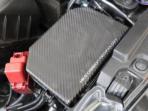 HKS 70026-AT014 Fuse Box Cover (carbon) for TOYOTA GR Corolla (G16E-GTS) 2022+ Photo-1