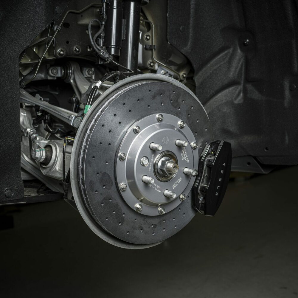 UNPLUGGED PERFORMANCE UP-MSMX2-133-2.1 Rear Brake Rotor Kit, Large Sweep, Carbon Ceramic + Racing Pad Kit for TESLA Model S 2021 Photo-0