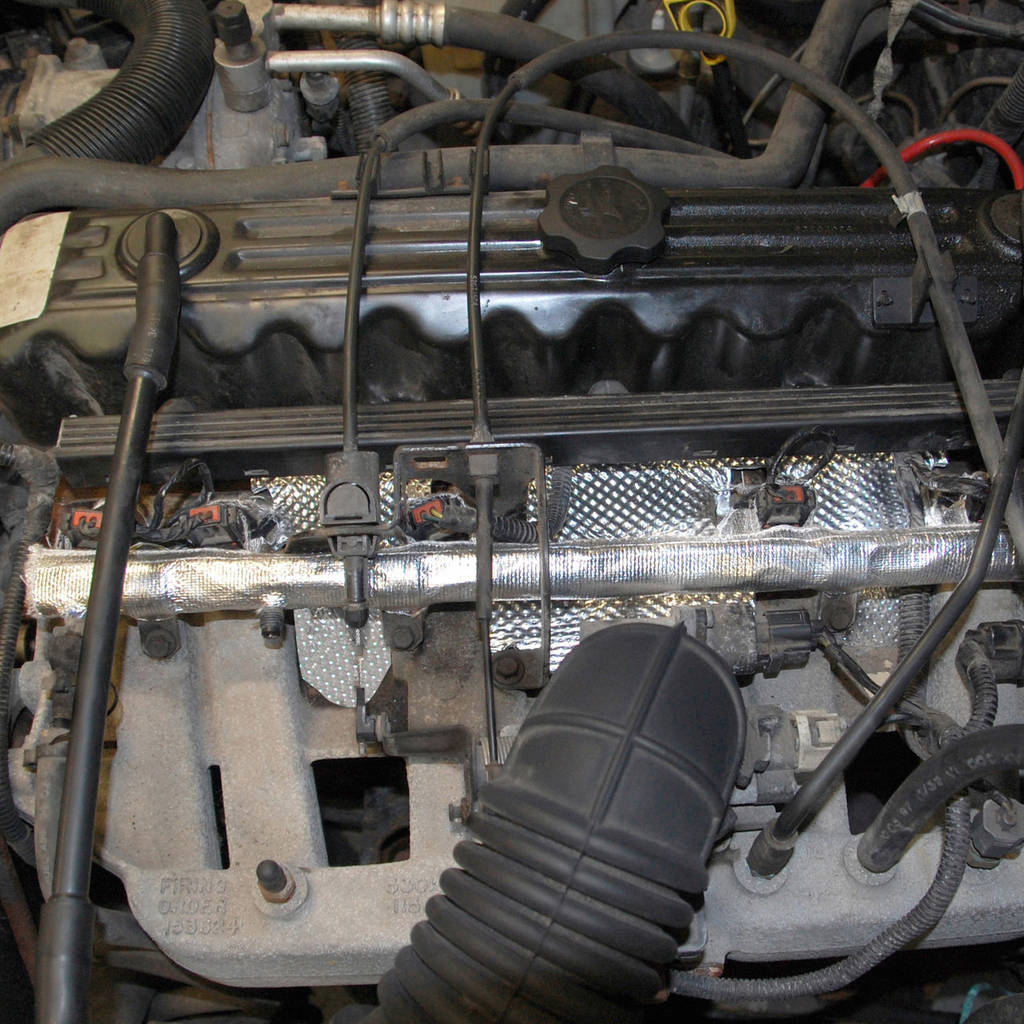 DEI 010378 Fuel Rail & Injecter Cover JEEP® 1997 2004 4.0L Engine Photo-4 