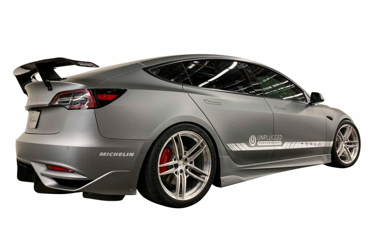 UNPLUGGED PERFORMANCE UP-M3-304-4.1 Ascension Rear Bumper - Optional Ascension-R Rear Diffuser Fins, Dry Carbon Gloss Clear for TESLA Model 3 Photo-1 